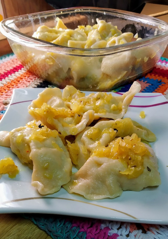 Una foto de Pasta rellena de papas y ricota