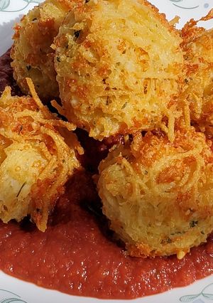 A picture of Spaghetti Balls and Meat sauce.