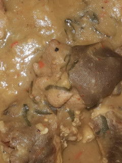 A picture of White soup with goat meat.