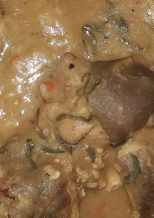 A picture of White soup with goat meat.