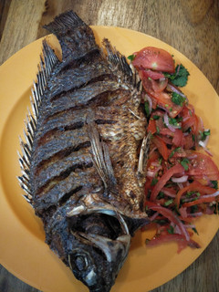 A picture of Fried fish with kachumbari.