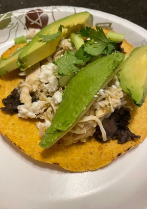 A picture of Salsa verde tostadas in the slow cooker.
