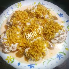 A picture of Left over rice dahi vada.