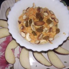 A picture of Apple, carrot Rabdhi.