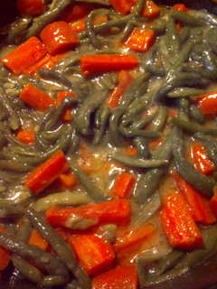A picture of Creamy carrots and green beans.