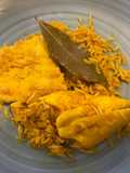 Guiso de merluza en amarillo