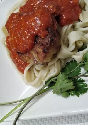 A picture of Fish pasta with purely homemade pasta strips.