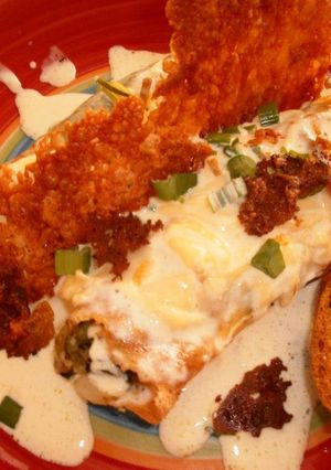 Una foto de Canelones de verdura y pollo gratinados