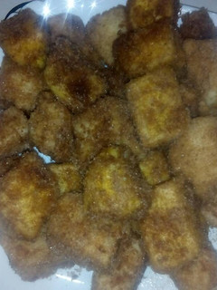Una foto de Leche frita aromatizada con naranja y canela