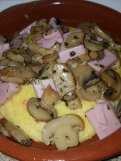 Una foto de Polenta con champiñones al ajíllo (vegano)