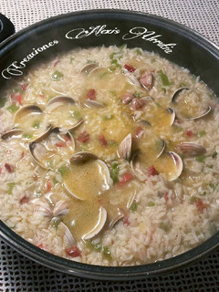 Una foto de Arroz thai caldoso con almejas