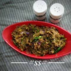 A picture of Burnt Eggplant in Bengali style.