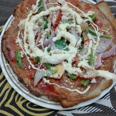 Bread omlette pizza A picture of Bread omlette pizza.