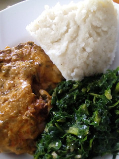 A picture of Ugali,chicken stew with mala and sukumawiki.