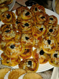 صورة لوصفة بيتزا توناتا رولي 🍕