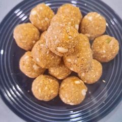 A picture of Tilgul ladoo with healthy seeds. Makar Sankranti special sweet.