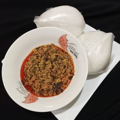 A picture of Tuwan Shinkafa with Egusi soup.