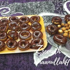 Homemade Chocolate Glazed Doughnuts and Mini Doughnuts A picture of Homemade Chocolate Glazed Doughnuts and Mini Doughnuts.