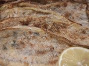 Una foto de milanesas al horno