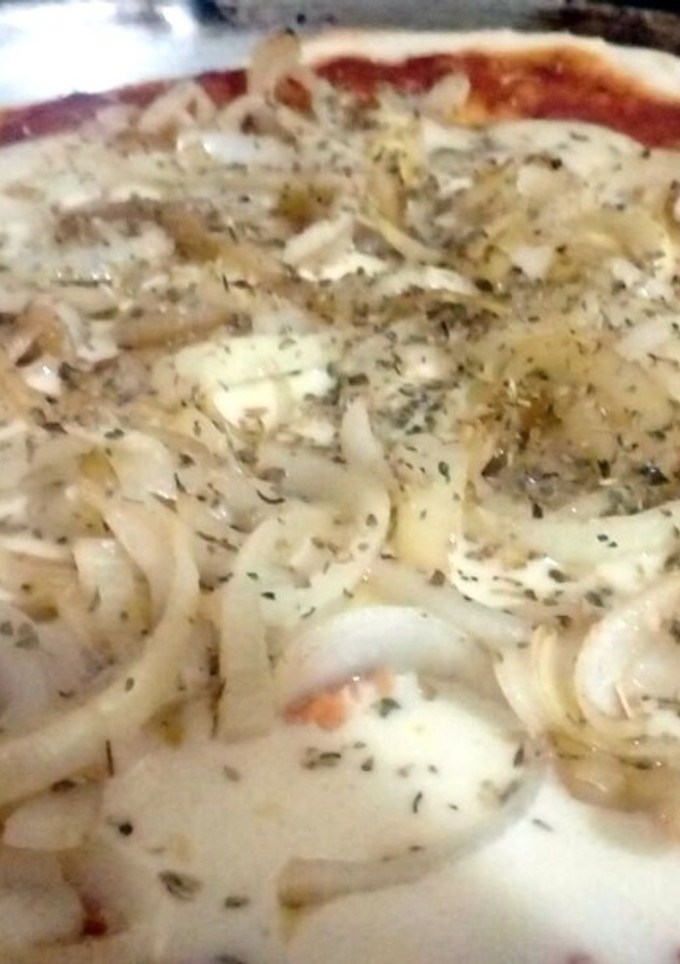 Una foto de Masa de pizza casera ESPECTACULAR!