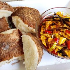 A picture of Boiled yam with ugba sauce.