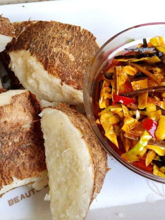 A picture of Boiled yam with ugba sauce.