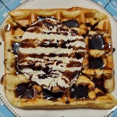 Eggless Waffle with ice cream A picture of Eggless Waffle with ice cream.