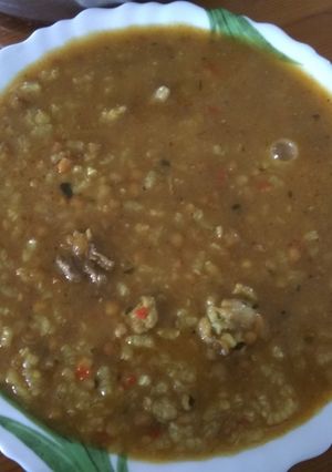 Foto principal de Lentejas a lo pobre con pollo y arroz PICANTE