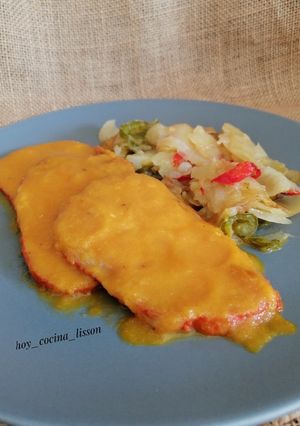 Una foto de Cinta de lomo en salsa
