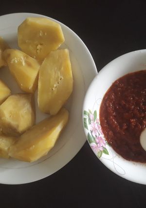A picture of Sweet potato with stew and egg.