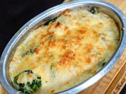 Una foto de brócoli gratinado