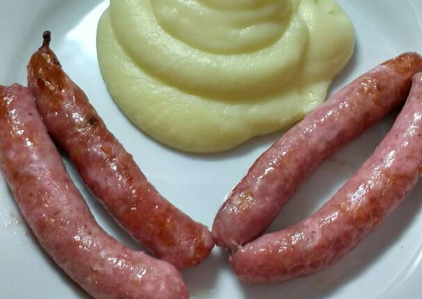 Salchichas con puré de patatas