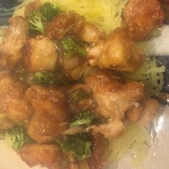 A picture of Broccoli and chicken stir fry.