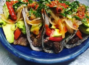 Una foto de Tacos de cecina