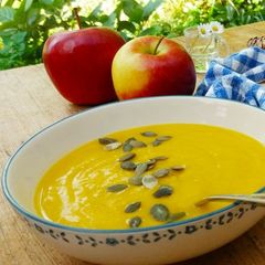 A picture of Pumpkin soup with apples.