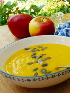 A picture of Pumpkin soup with apples.
