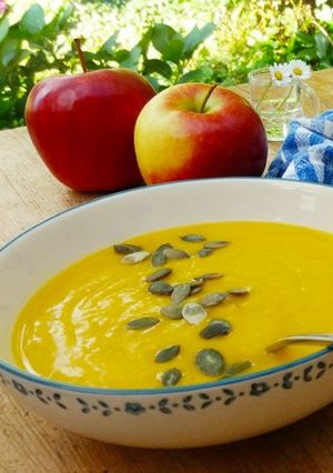 A picture of Pumpkin soup with apples.