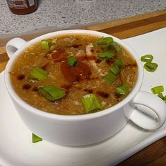 A picture of Pakistani style Schezwan soup.