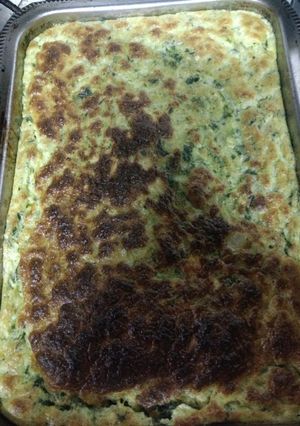 Una foto de Soufflé de pollo, espinaca y zapallitos