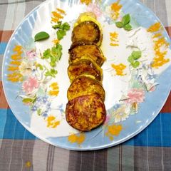 A picture of Stuffed baigan bhaja.