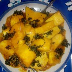A picture of Yam porriage with utazi leaves.