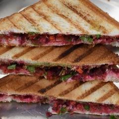 A picture of Carrot and beetroot sandwich.