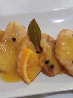 Una foto de Merluza con salsa de naranja