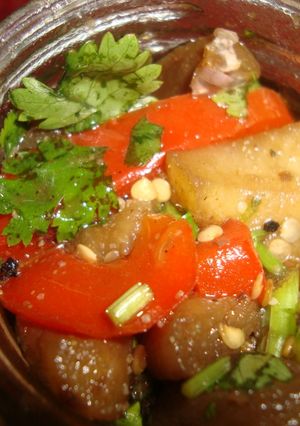 Una foto de Berenjenas frescas con cilantro