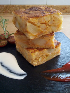 Una foto de Tortilla de patatas con cebolla