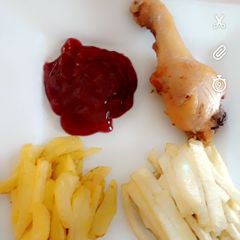 A picture of Chicken and chips.
