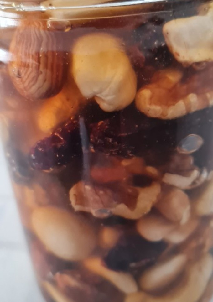 Una foto de Frutos secos con miel