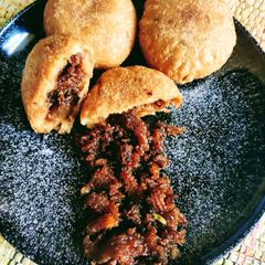 A picture of Atta kakara pitha(traditional famous sweet dish of Odisha).