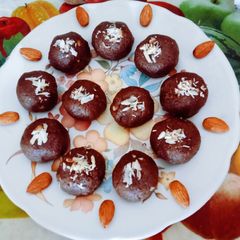 A picture of Healthy tasty nutritious energy packed sweet badam pisin ladoo.