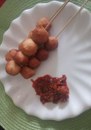 A picture of Puff-Puff & Pepper Sauce.